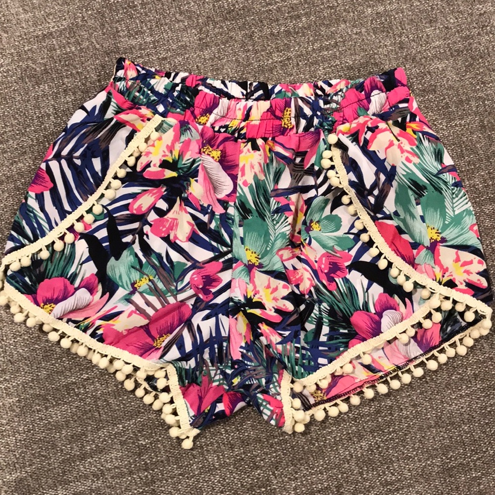 Tropical shorts with flaps. size medium.